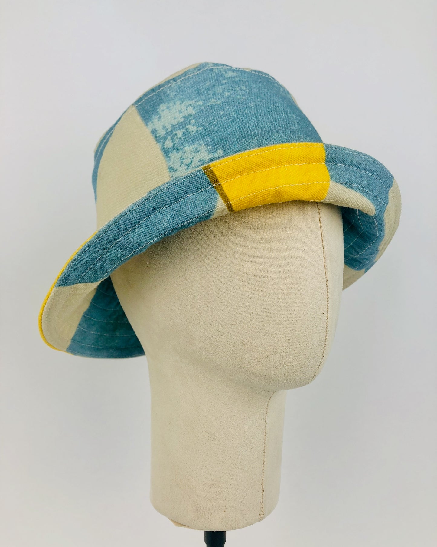Cute hand crafter bucket hat made with thrifted materials