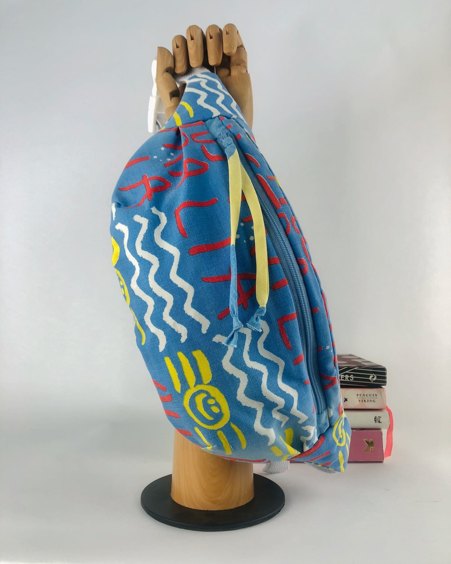 Handmade bumnag made from vintage Ken Done 80s fabric with sun, sand and blue skies
