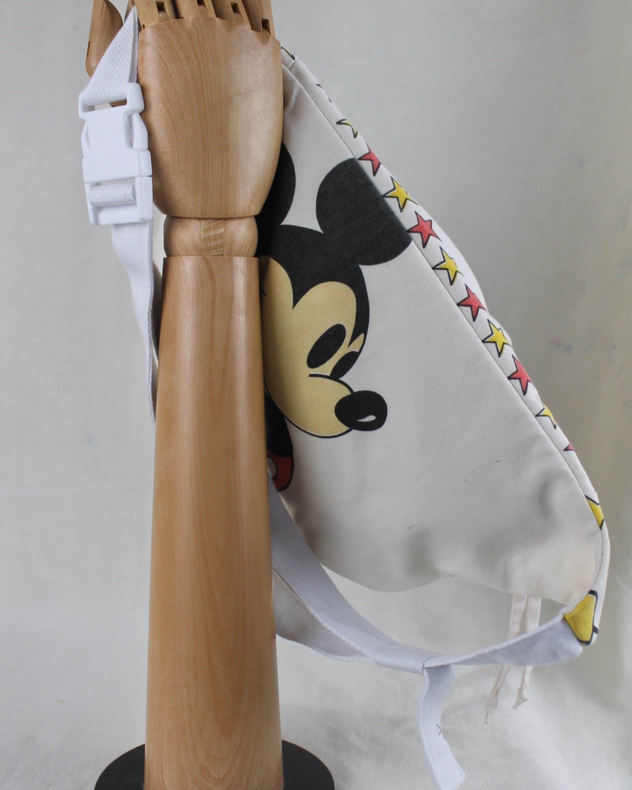 Back view of handmade, upcycled bumbag showing adjustable strap