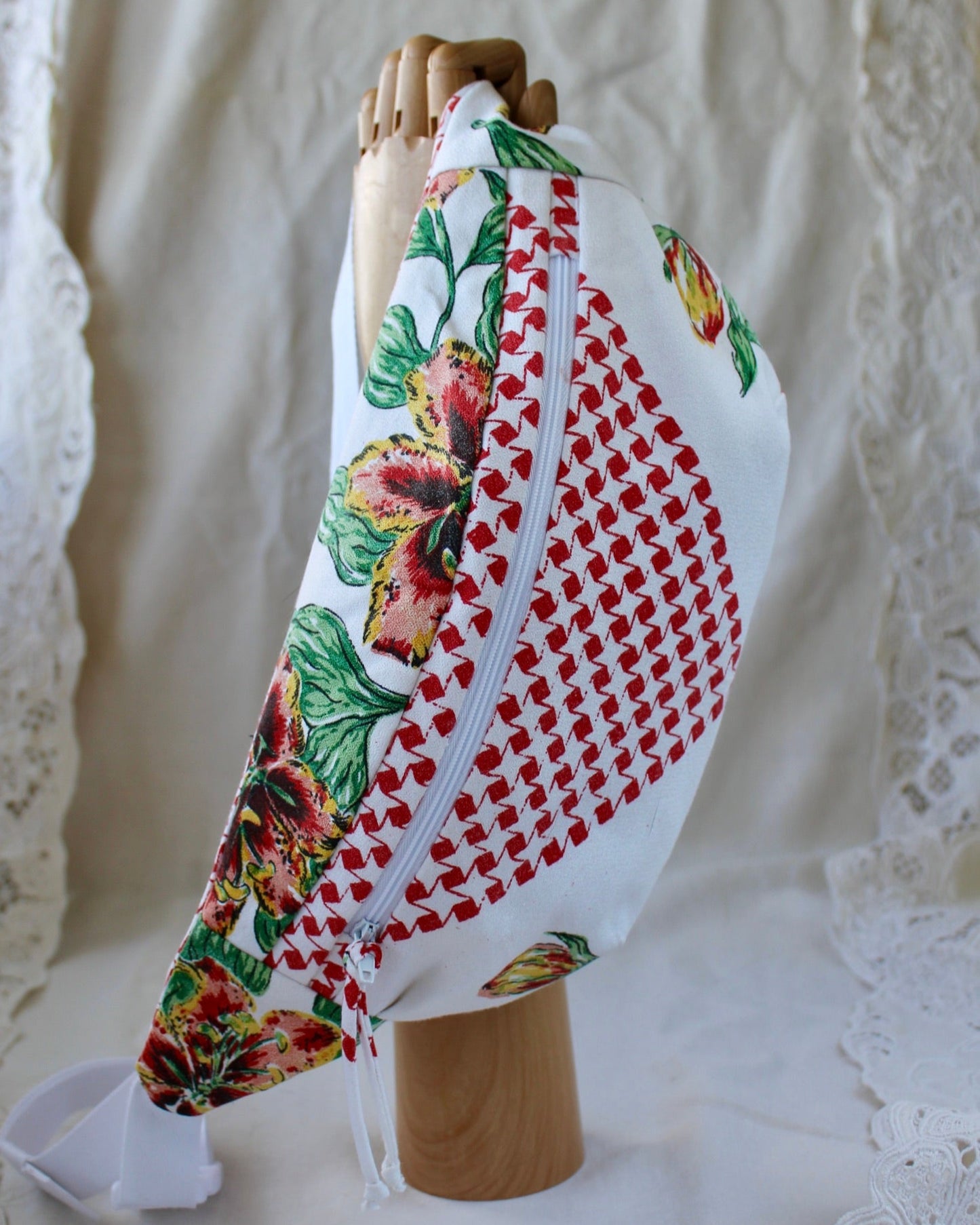 Front view of handmade fanny pack made from a mid century style tablecloth