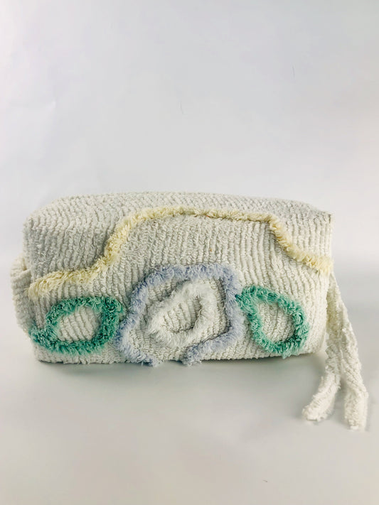 Hand made chenille make up bag with green, blue and cream tufts