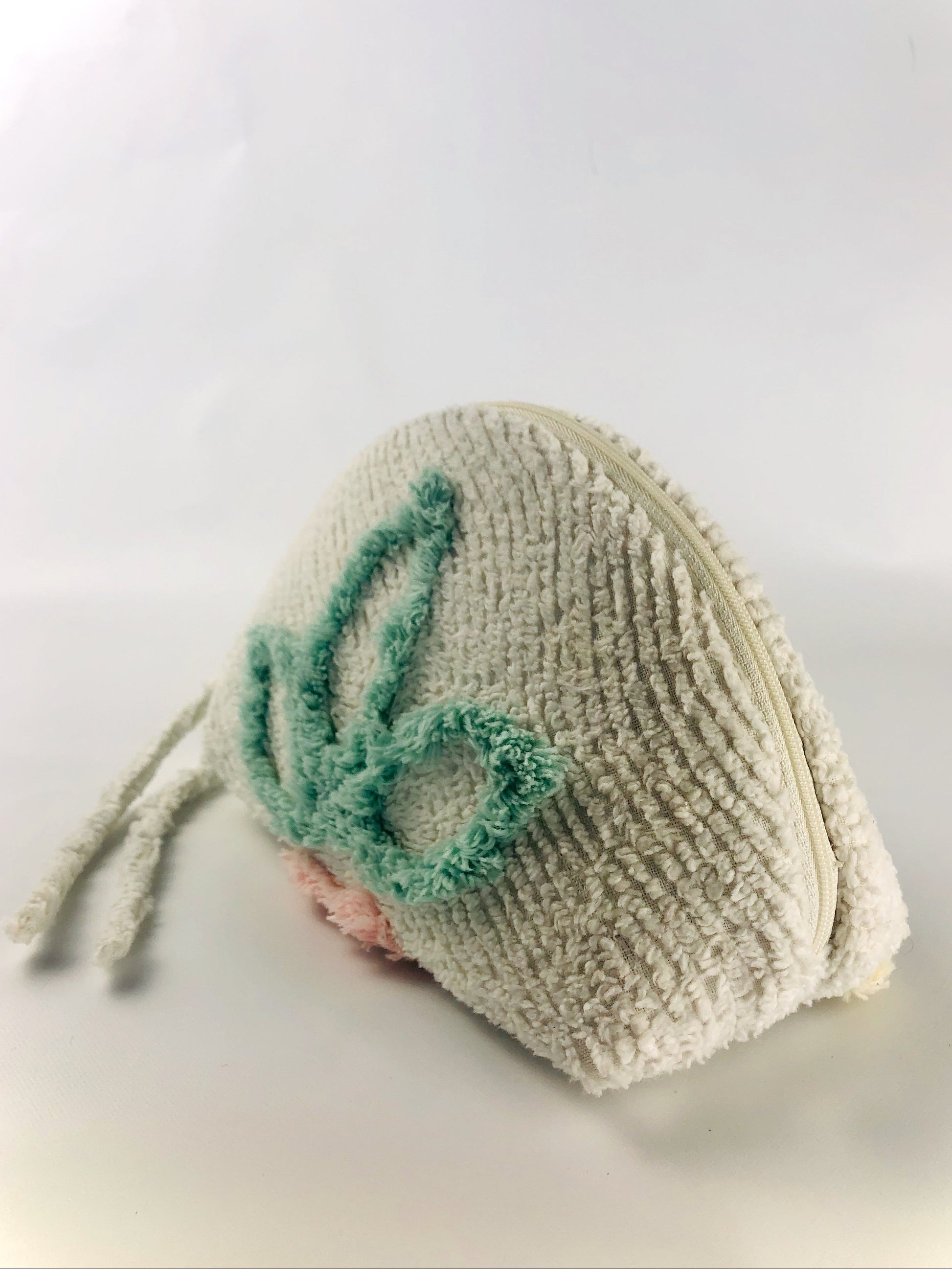 Dumpling makeup bag made from white chenille in white, green and pink