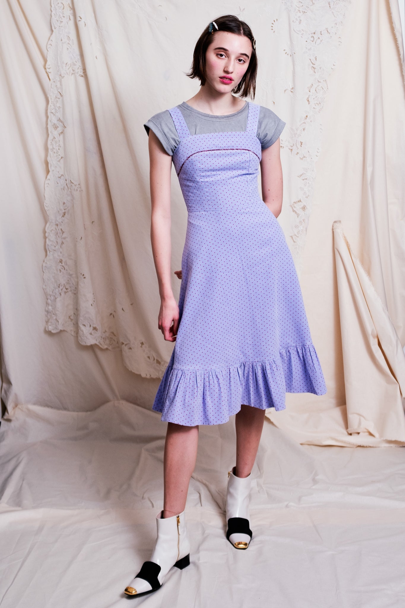 Dolly dress with straps and fitted bodice and waist and a skirt finishing below the knees